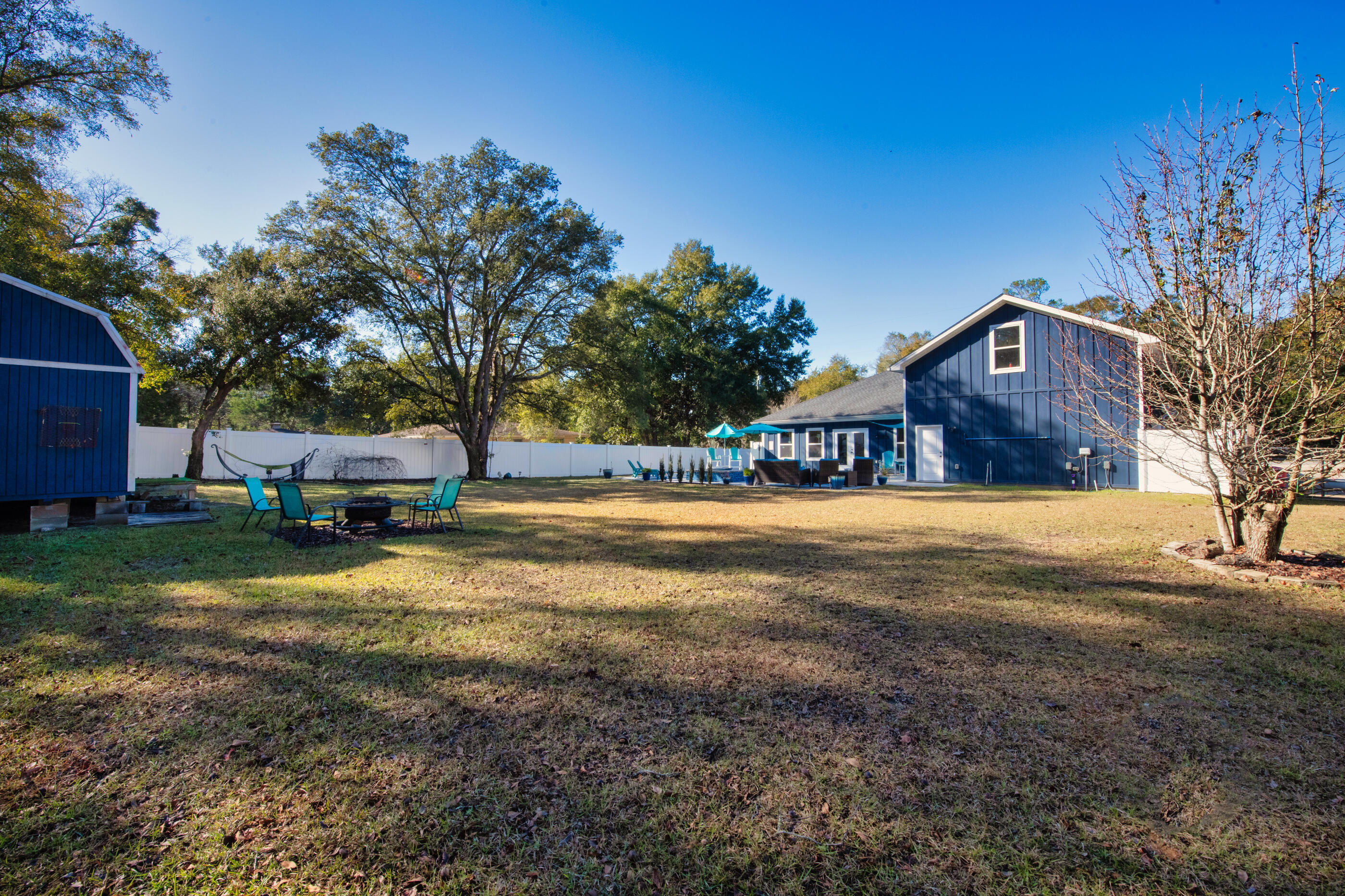 342 Eastern Street Freeport, FL 32439 - Photo 77 of 77 a view of a house with a yard