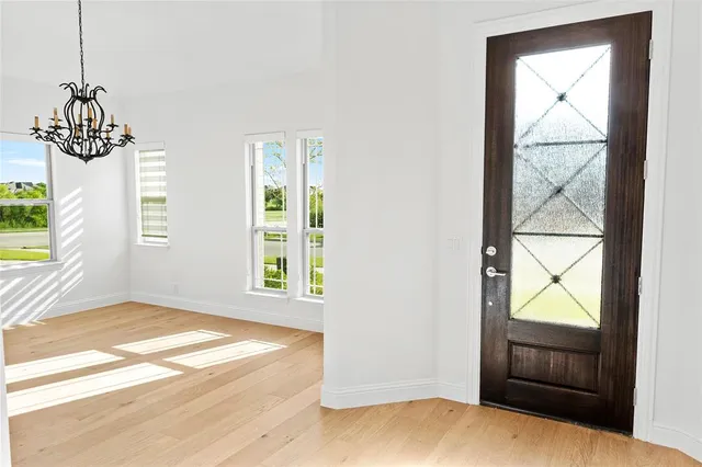 a view of an empty room and window