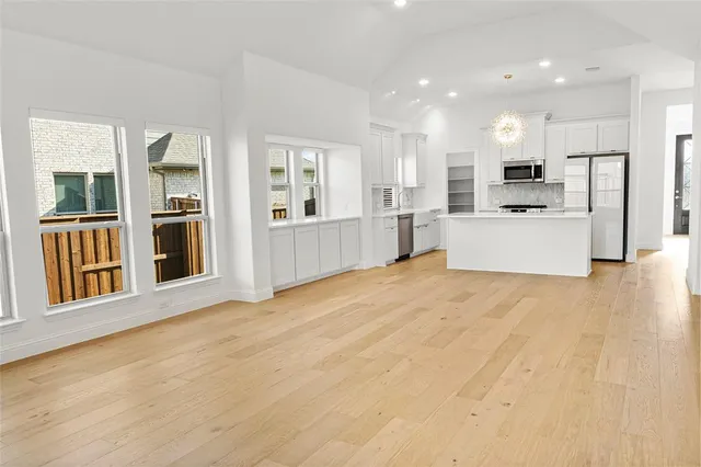 a view of a lake with a city