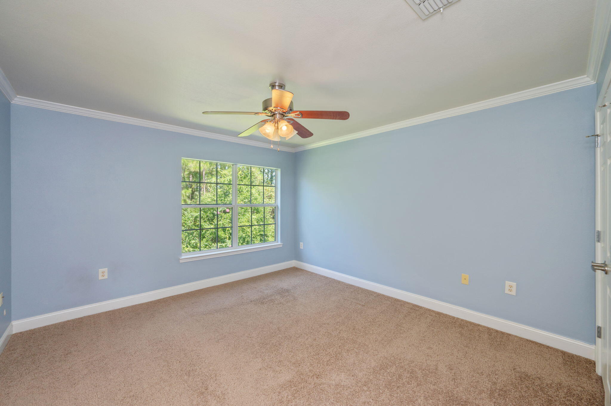 535 Wingspan Way Crestview, FL 32536 - Photo 21 of 26 an empty room with a window