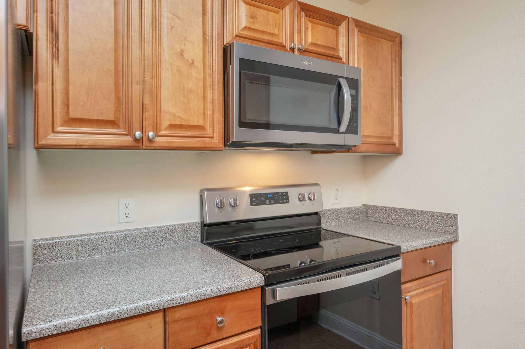 535 Wingspan Way Crestview, FL 32536 - Photo 25 of 26 a kitchen with a stove and a microwave
