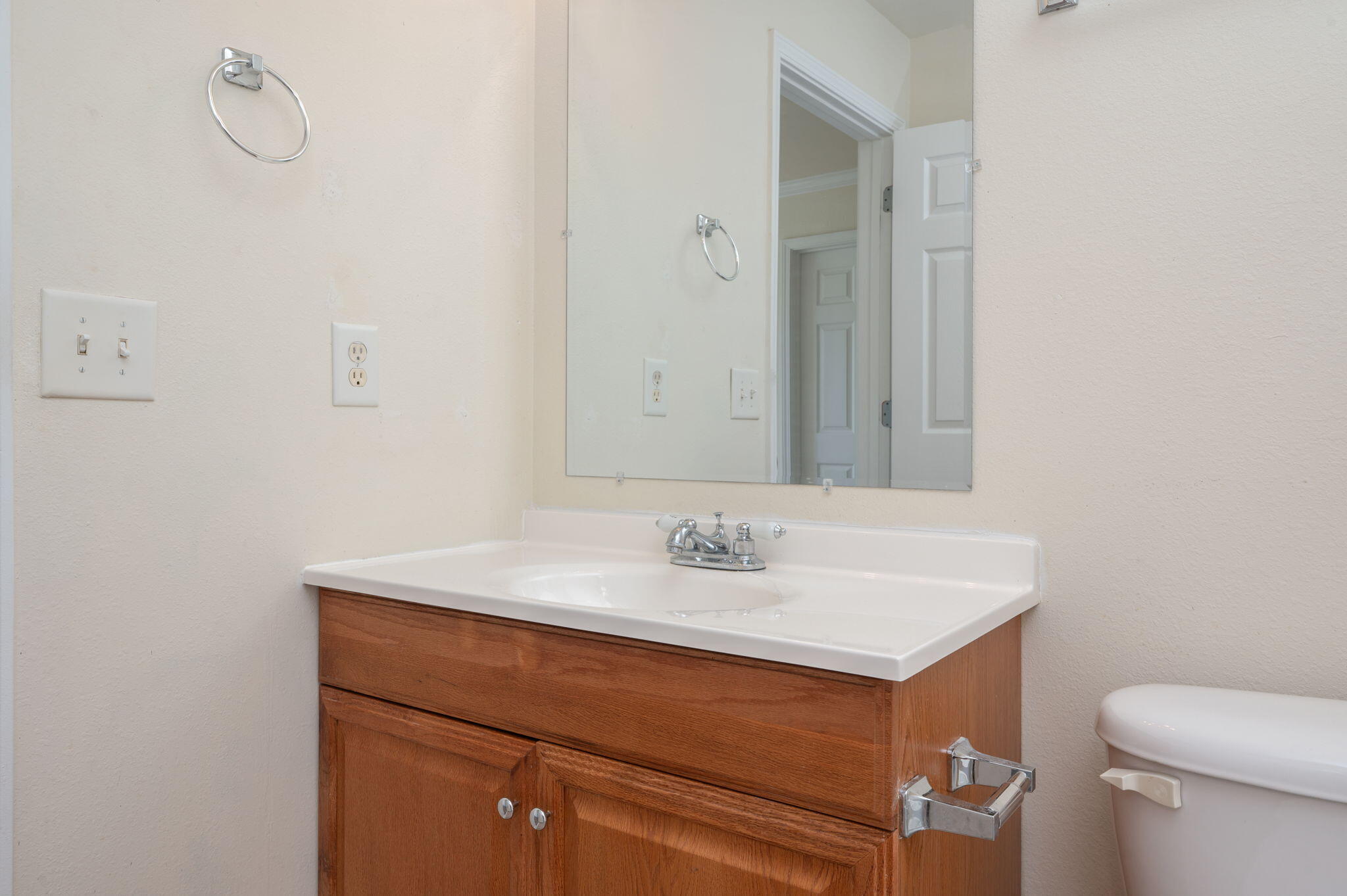535 Wingspan Way Crestview, FL 32536 - Photo 26 of 26 a bathroom with a sink vanity and a toilet