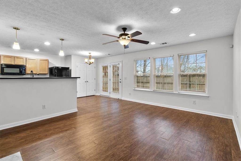 307 Meadows Lane Canton, GA 30114 - Photo 11 of 33 a view of a kitchen with a sink and a window