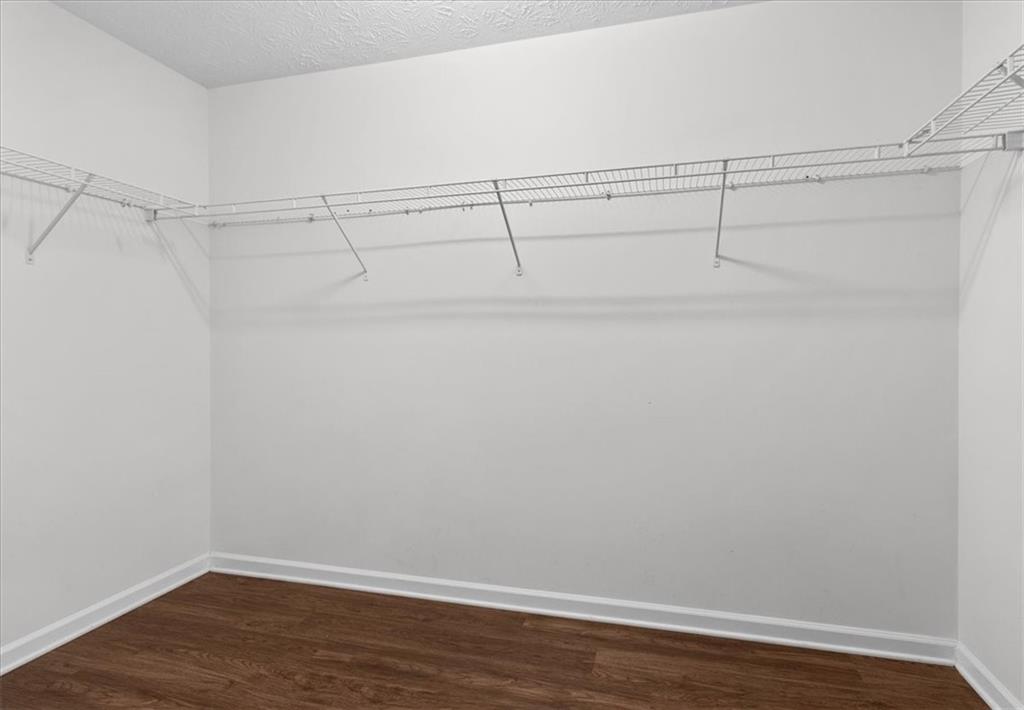 307 Meadows Lane Canton, GA 30114 - Photo 18 of 33 a view of a room with racks on the wall