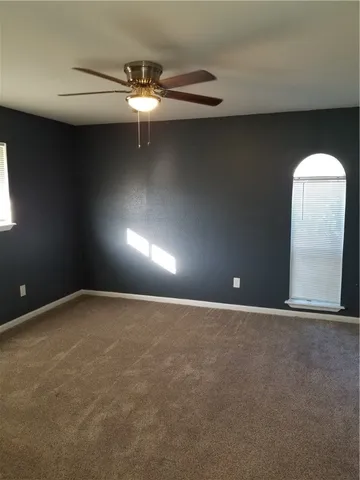 a bathroom with a toilet a sink and bathtub