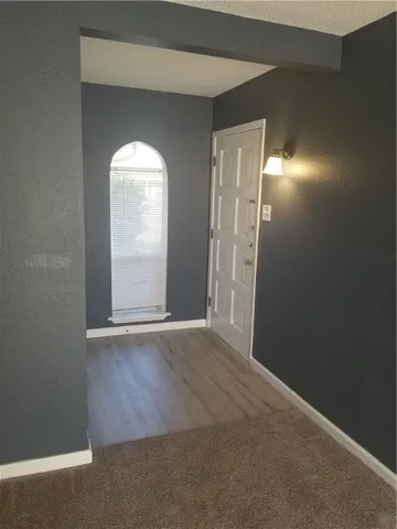 a view of a livingroom with a fireplace