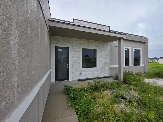 a house view with a backyard space