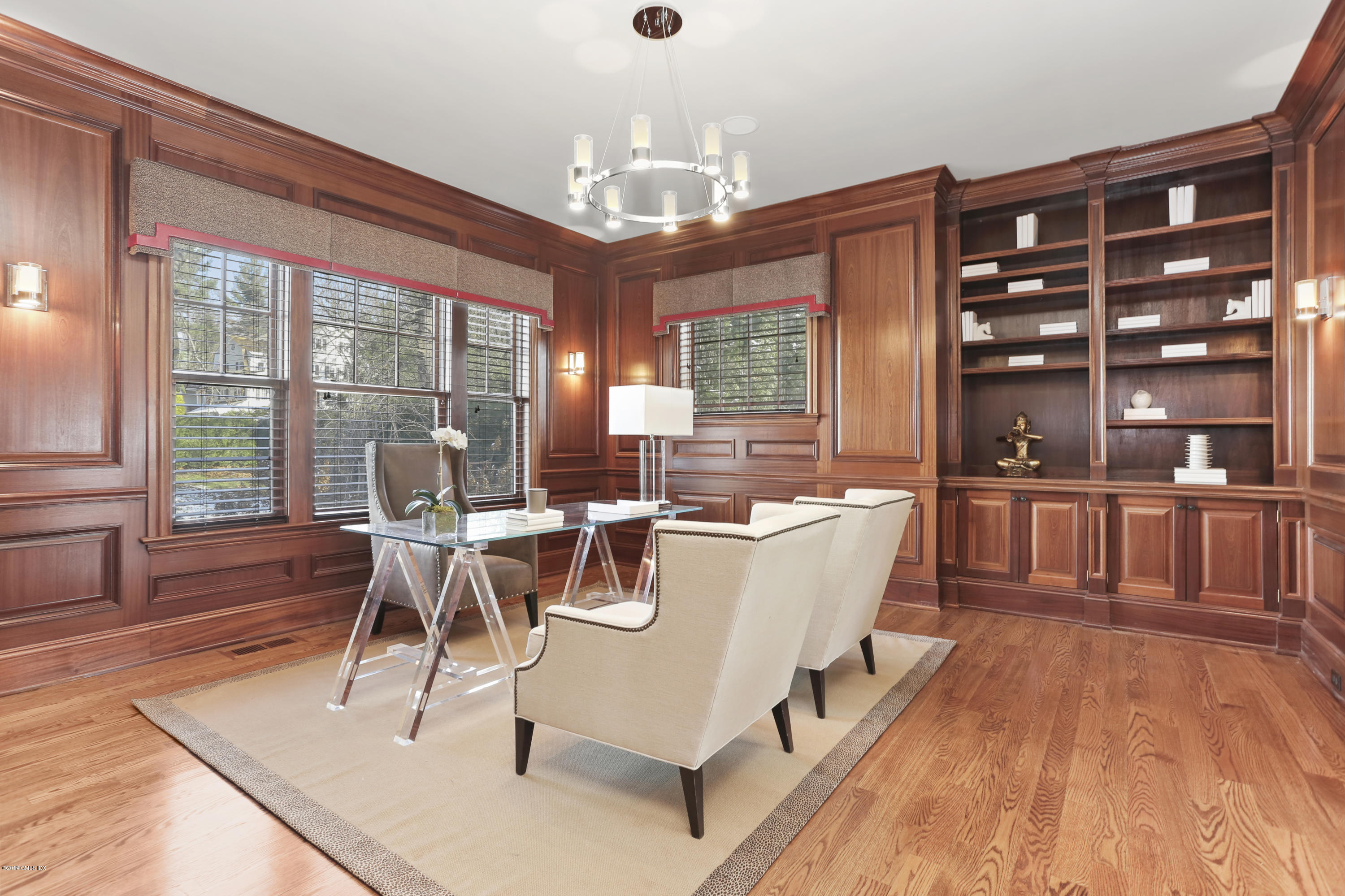10 Andrews Road Greenwich, CT 06830 - Photo 13 of 29 a view of a dining room with furniture window and wooden floor