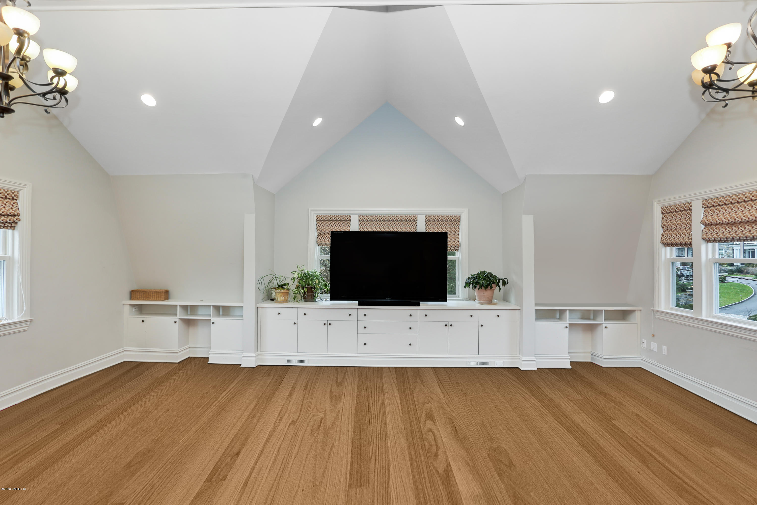10 Andrews Road Greenwich, CT 06830 - Photo 17 of 29 a living room with furniture and a flat screen tv