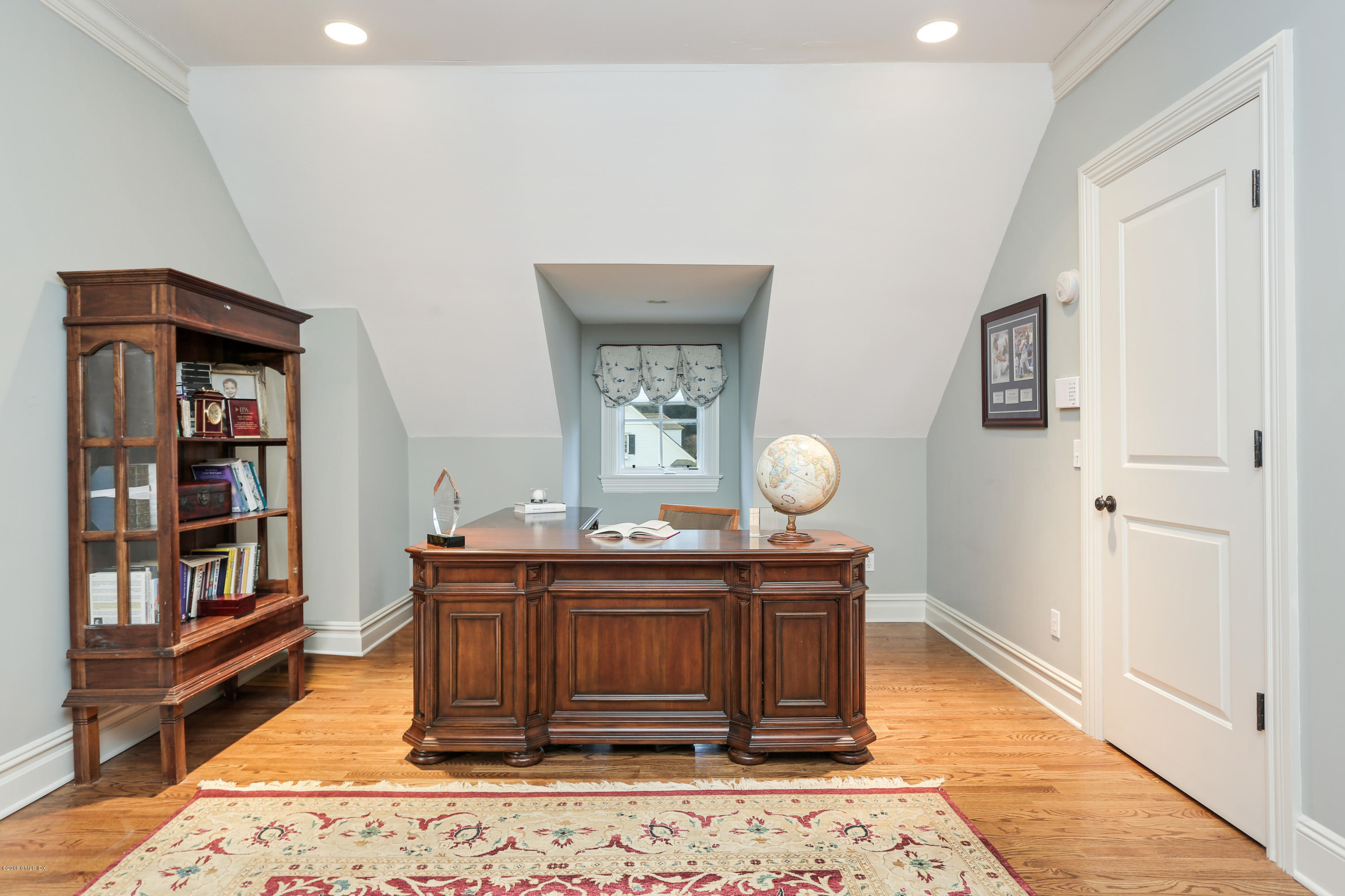 10 Andrews Road Greenwich, CT 06830 - Photo 21 of 29 a view of a workspace with furniture and wooden floor