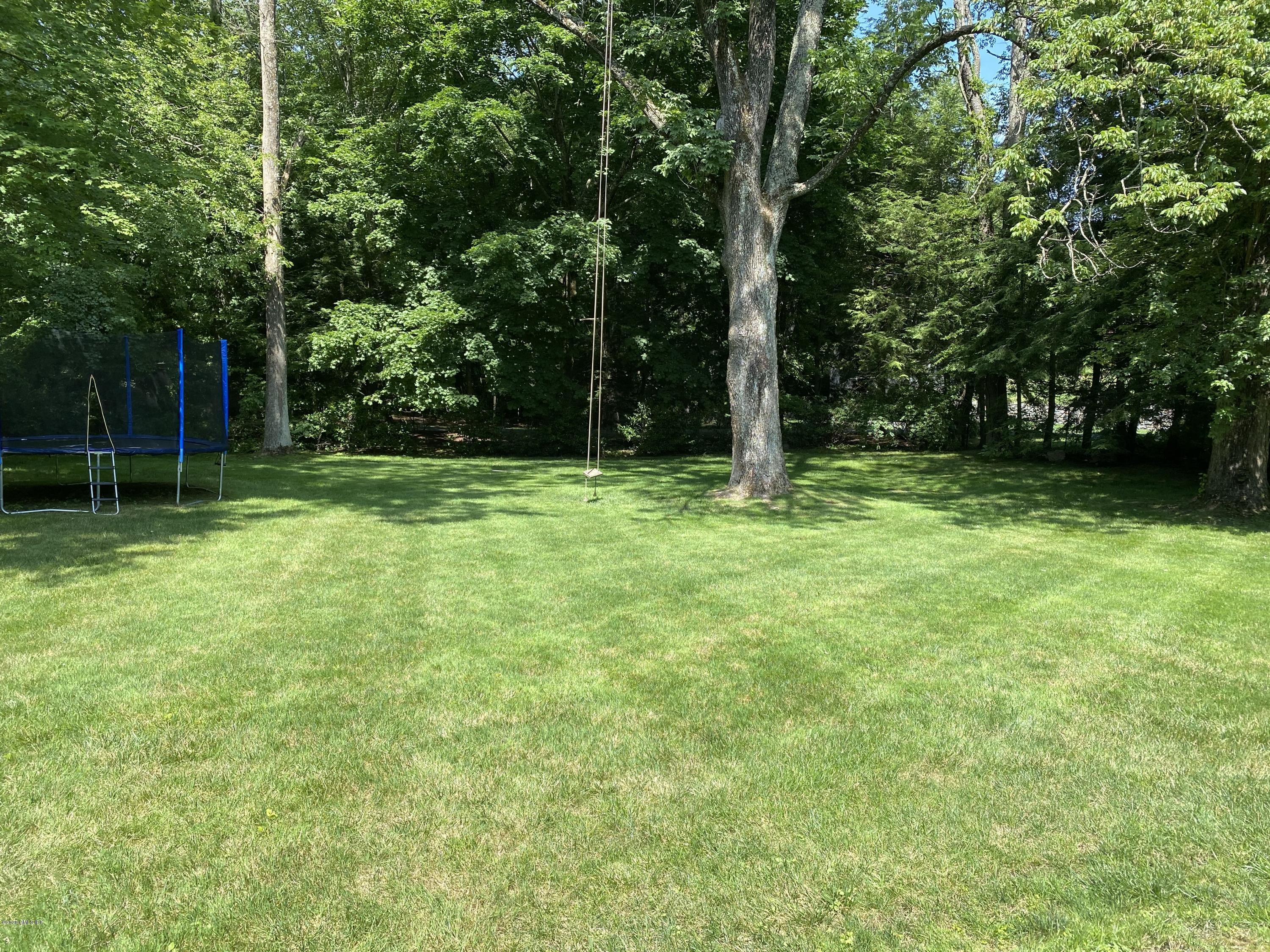 10 Andrews Road Greenwich, CT 06830 - Photo 3 of 29 a view of outdoor space with deck and yard