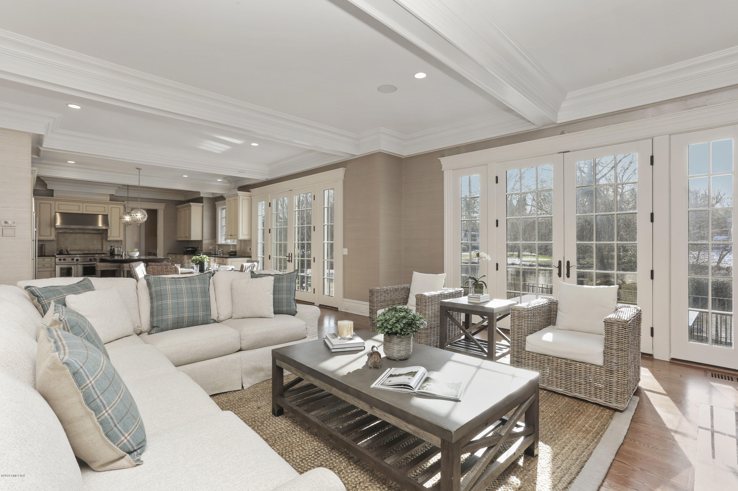 10 Andrews Road Greenwich, CT 06830 - Photo 8 of 29 a living room with furniture and a large window