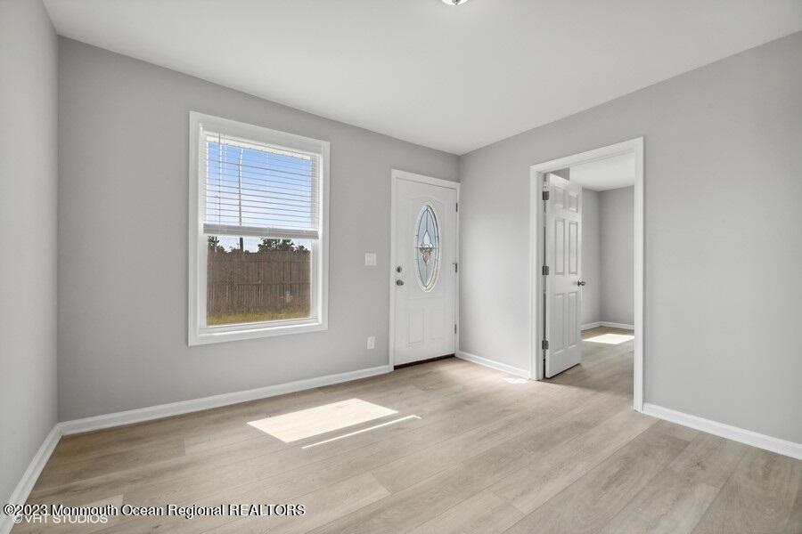 3 Monroe Street Keyport, NJ 07735 - Photo 11 of 16 a view of an empty room with a window