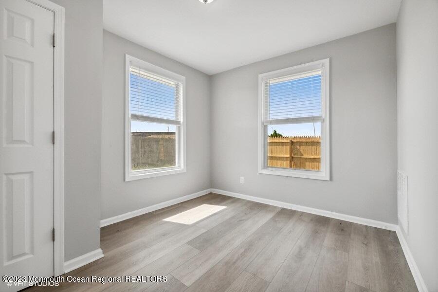 3 Monroe Street Keyport, NJ 07735 - Photo 13 of 16 an empty room with windows