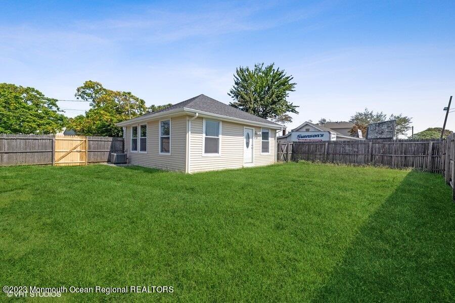 3 Monroe Street Keyport, NJ 07735 - Photo 15 of 16 a front view of house with yard and green space