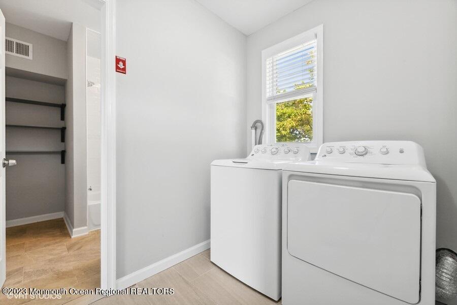 3 Monroe Street Keyport, NJ 07735 - Photo 4 of 16 a utility room with dryer and washer