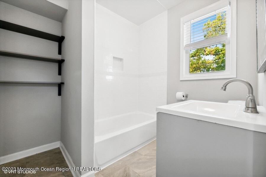 3 Monroe Street Keyport, NJ 07735 - Photo 5 of 16 a bathroom with a sink and a bathtub