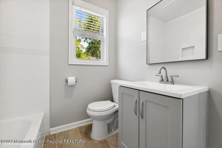 3 Monroe Street Keyport, NJ 07735 - Photo 6 of 16 a bathroom with a sink and a toilet