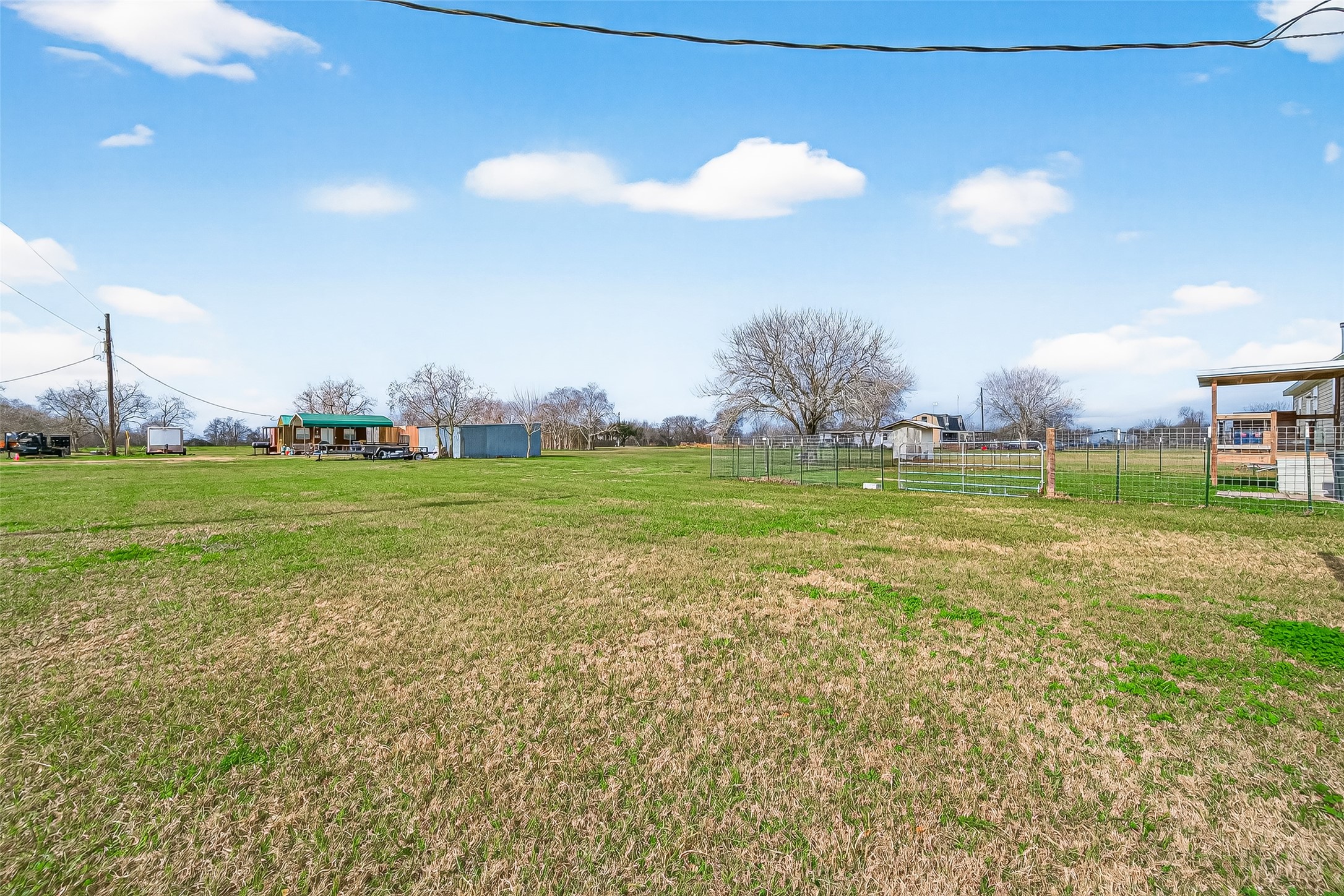 9820 Oberrender Road Needville, TX 77461 - Photo 30 of 34 Backyard Leading To Workshop