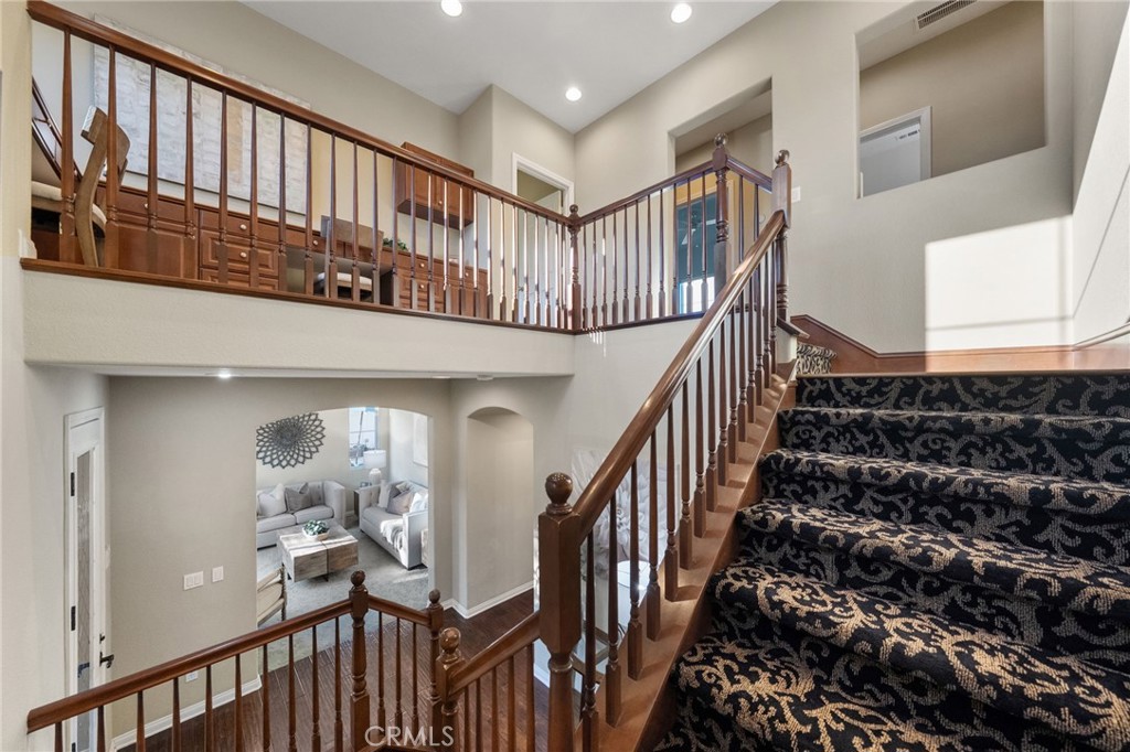 28889 Edenton Way Temecula, CA 92591 - Photo 19 of 56 View of stairwell and second floor landing