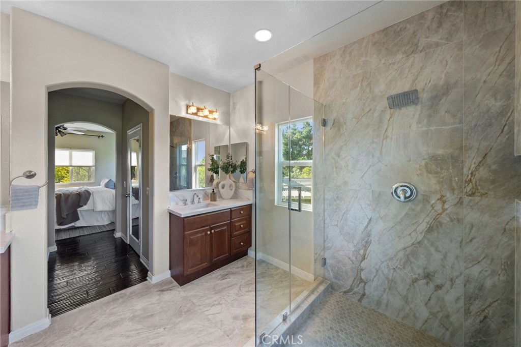 28889 Edenton Way Temecula, CA 92591 - Photo 25 of 56 Primary bathroom with custom enlarged shower and beautiful floors