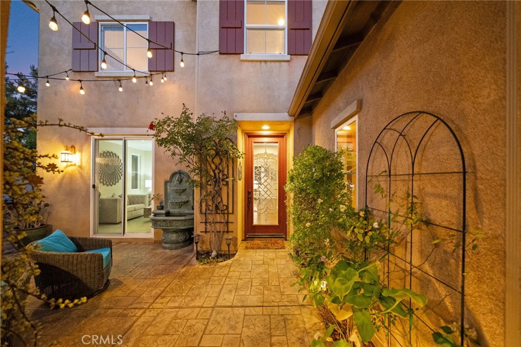 28889 Edenton Way Temecula, CA 92591 - Photo 33 of 56 Inside front door in courtyard to private entrance to main home.