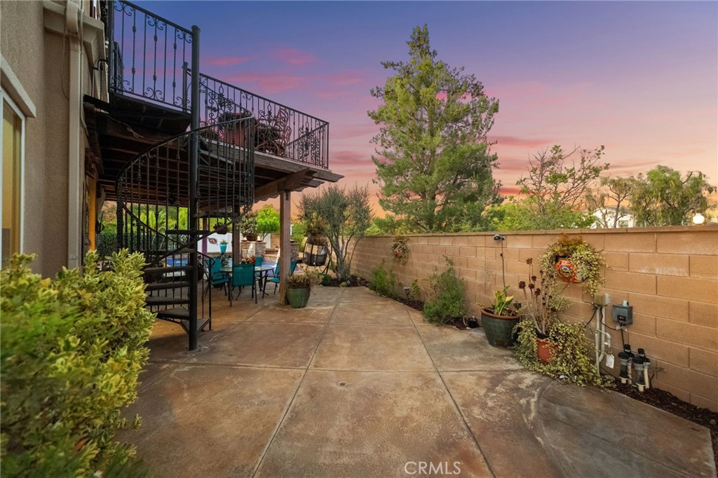 28889 Edenton Way Temecula, CA 92591 - Photo 36 of 56 BAckyard patio area with spiral staircase to private balcony with views!