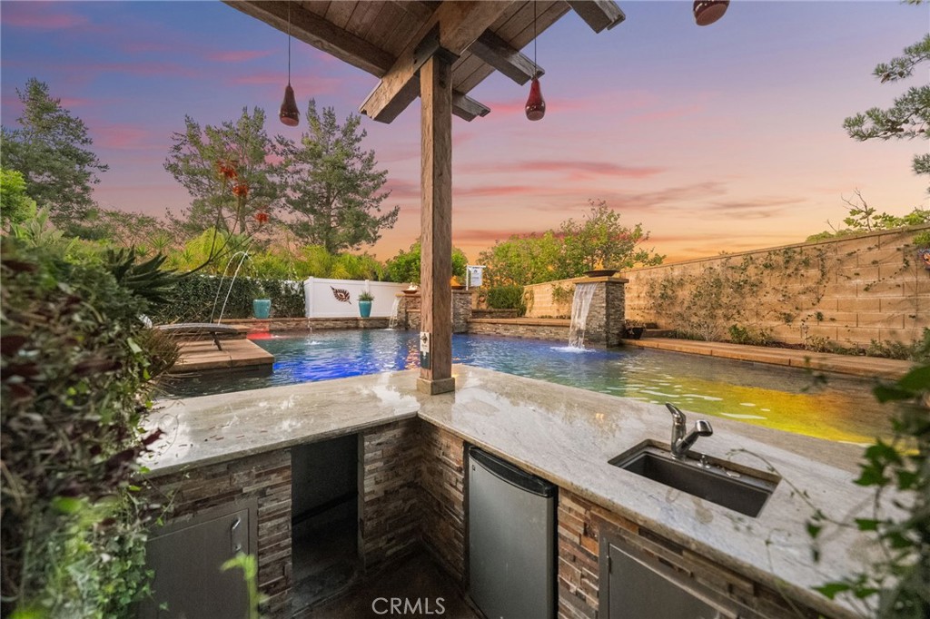 28889 Edenton Way Temecula, CA 92591 - Photo 39 of 56 Private swim-up bar with seating in pool, sink and refrigerator for all your entertaining! You never have to leave the pool!