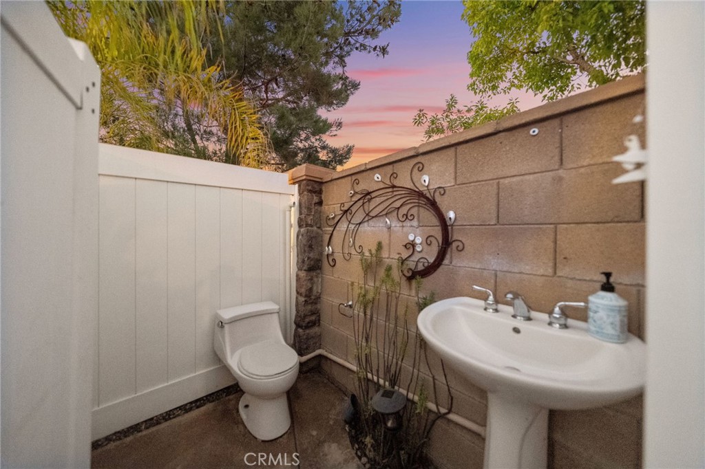 28889 Edenton Way Temecula, CA 92591 - Photo 43 of 56 Shhhh! Private outdoor bathroom and a shower befind door! Tucked away and very private!