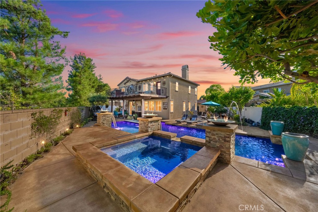 28889 Edenton Way Temecula, CA 92591 - Photo 5 of 56 View of backyard pool, spa and home from the back corner
