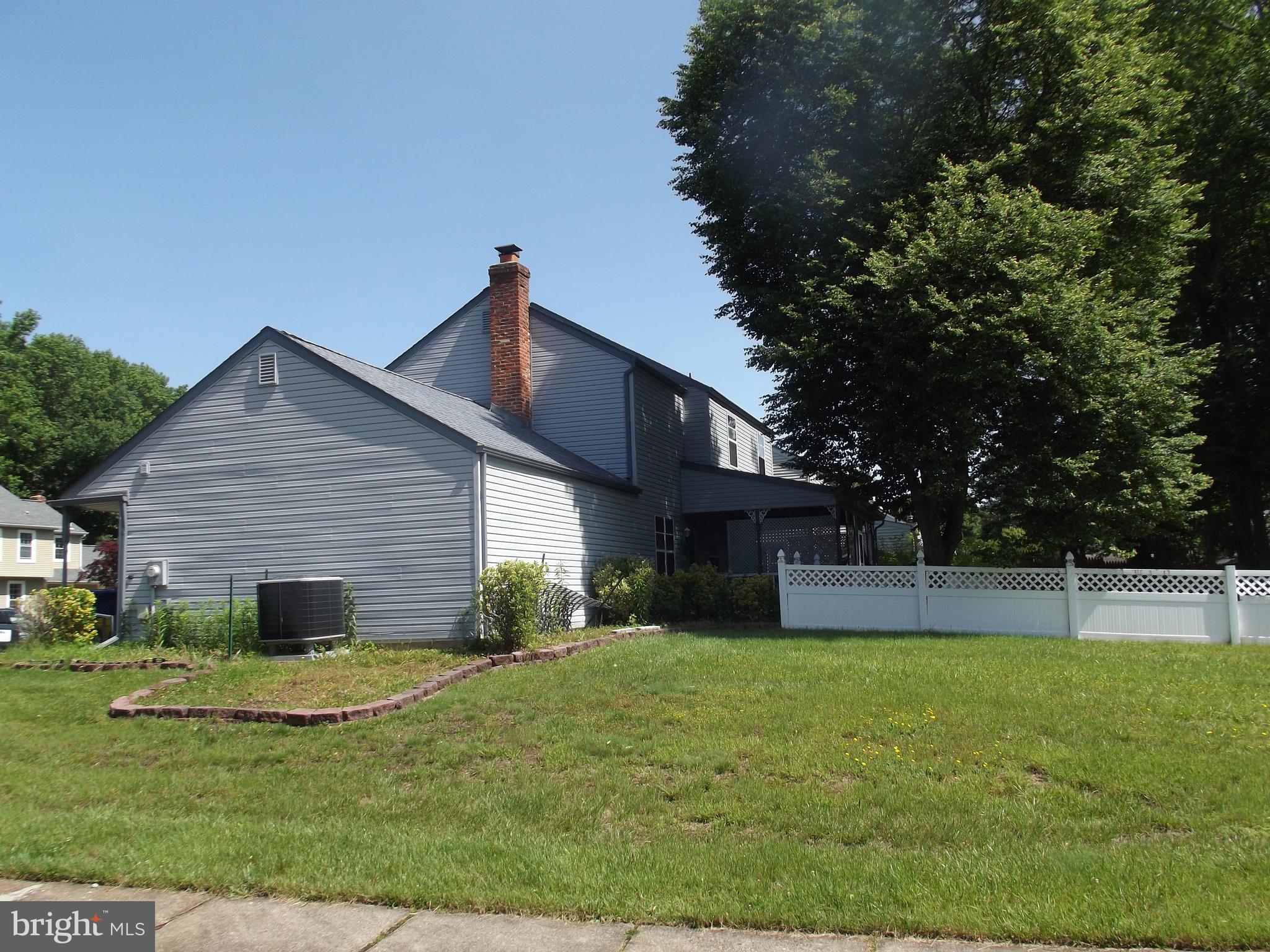20 Devonshire Drive Westampton, NJ 08060 - Photo 5 of 7 a view of a house with a yard
