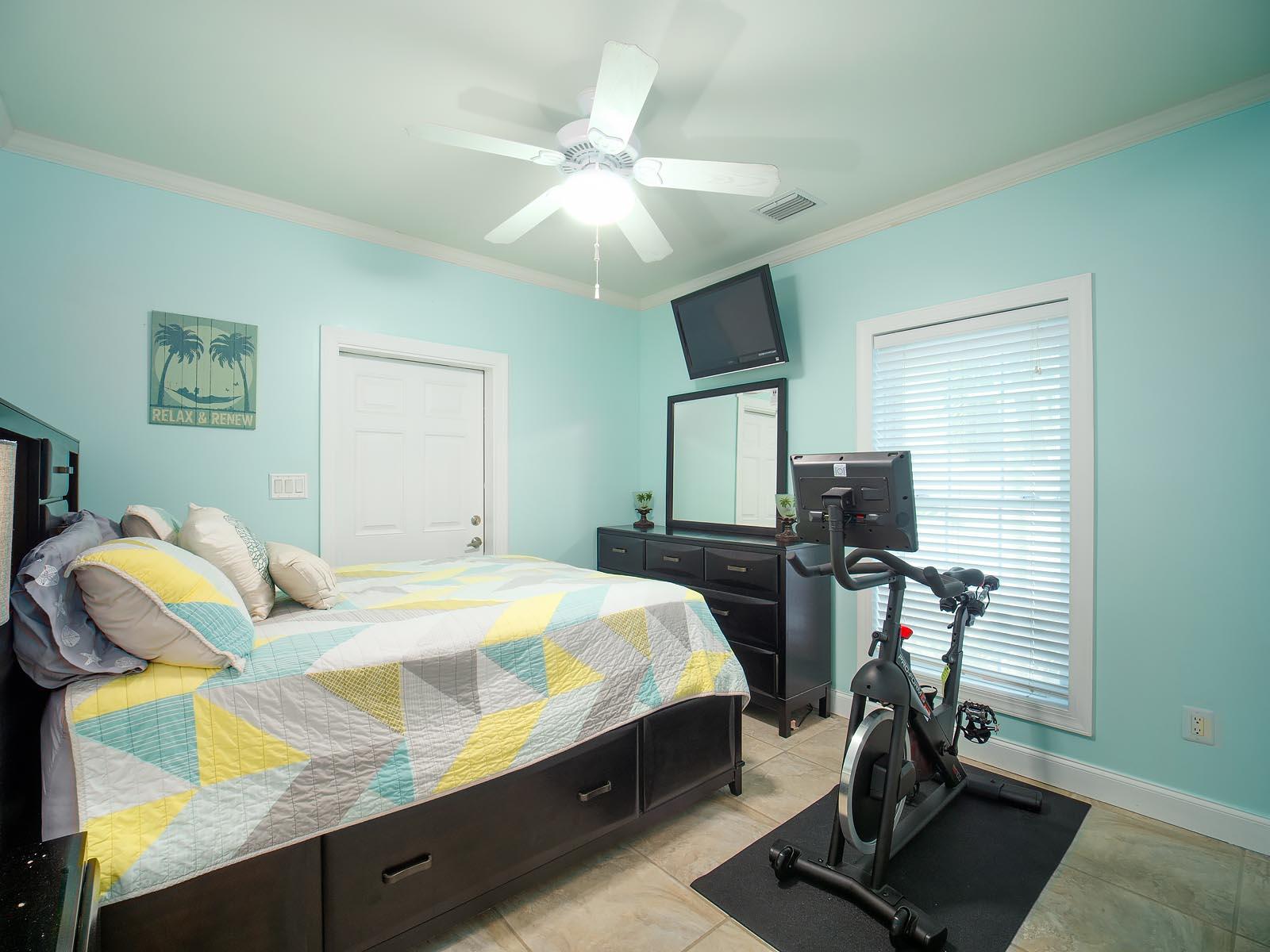 83 Palm Drive Key West, FL 33040 - Photo 13 of 35 a bedroom with a bed and a flat screen tv