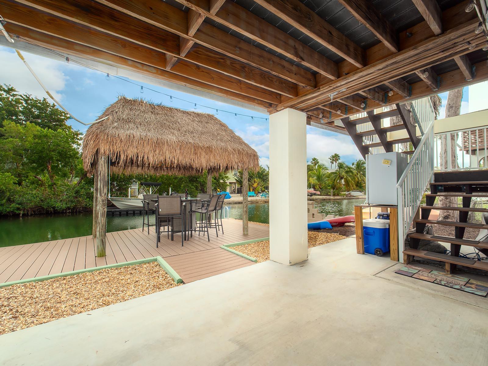 83 Palm Drive Key West, FL 33040 - Photo 18 of 35 a view of a porch with furniture