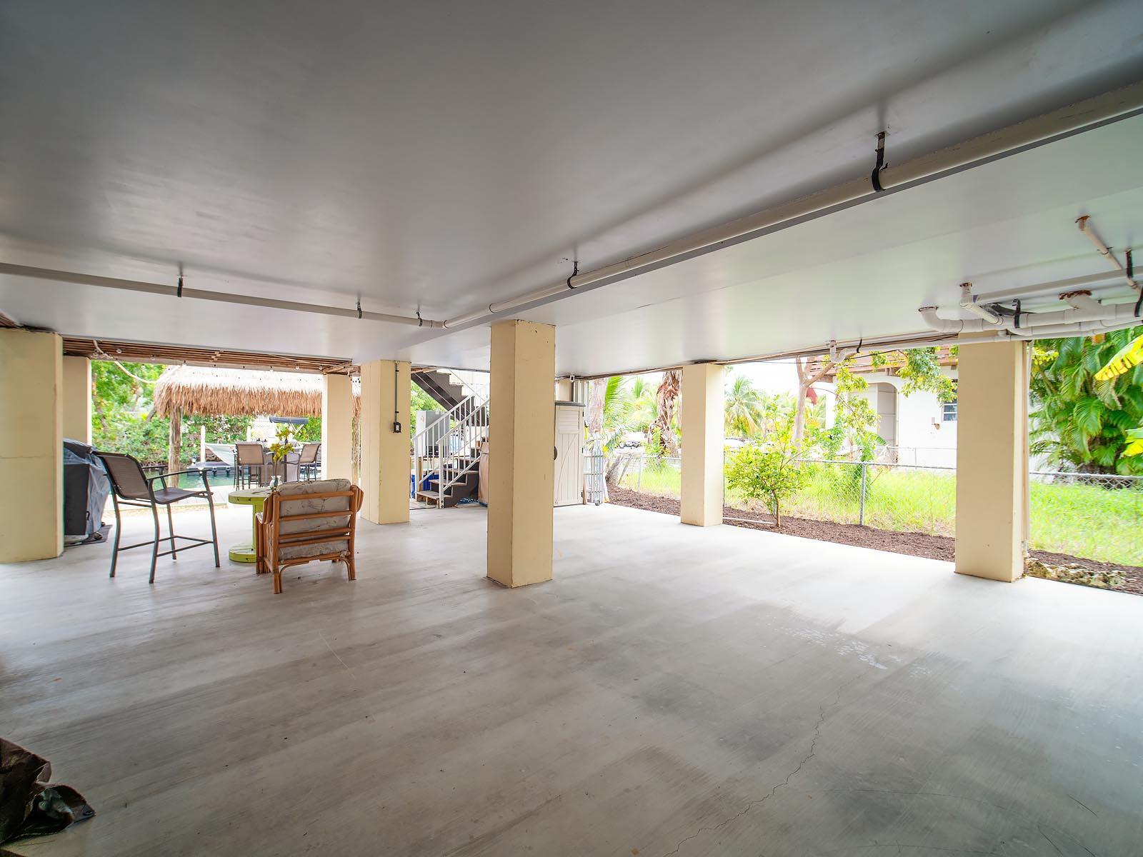 83 Palm Drive Key West, FL 33040 - Photo 23 of 35 a view of a living room and floor to ceiling window