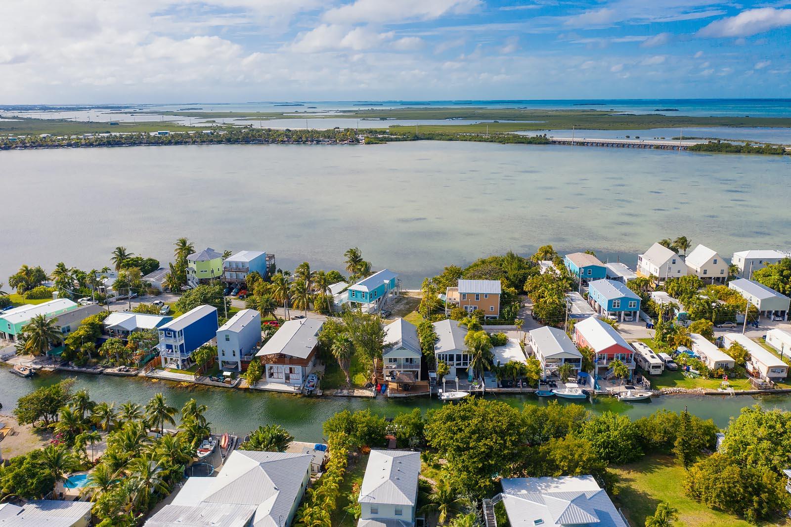 83 Palm Drive Key West, FL 33040 - Photo 35 of 35 a view of swimming pool with seating space and hardwood floor