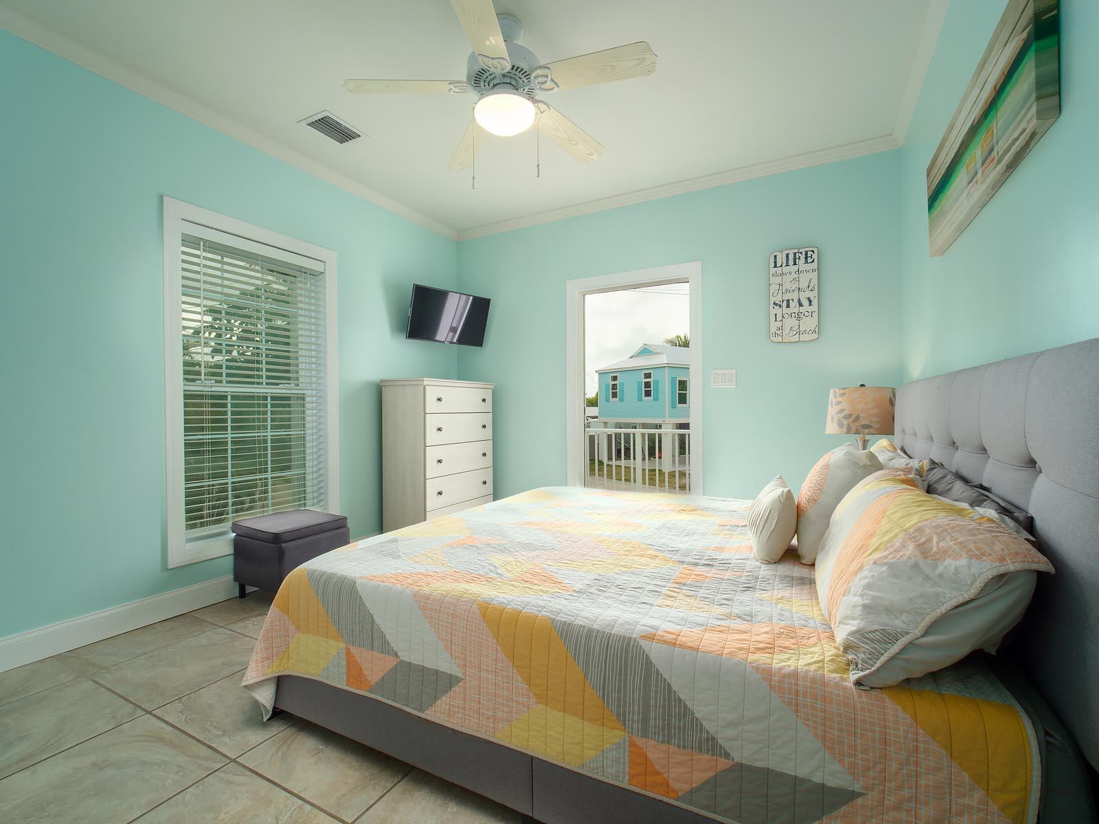 83 Palm Drive Key West, FL 33040 - Photo 10 of 35 a bedroom with a bed and a window