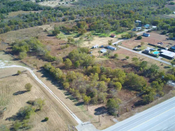a view of a wooden floor with a yard