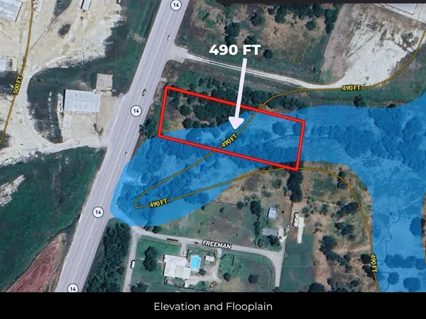 a view of a house with a tree