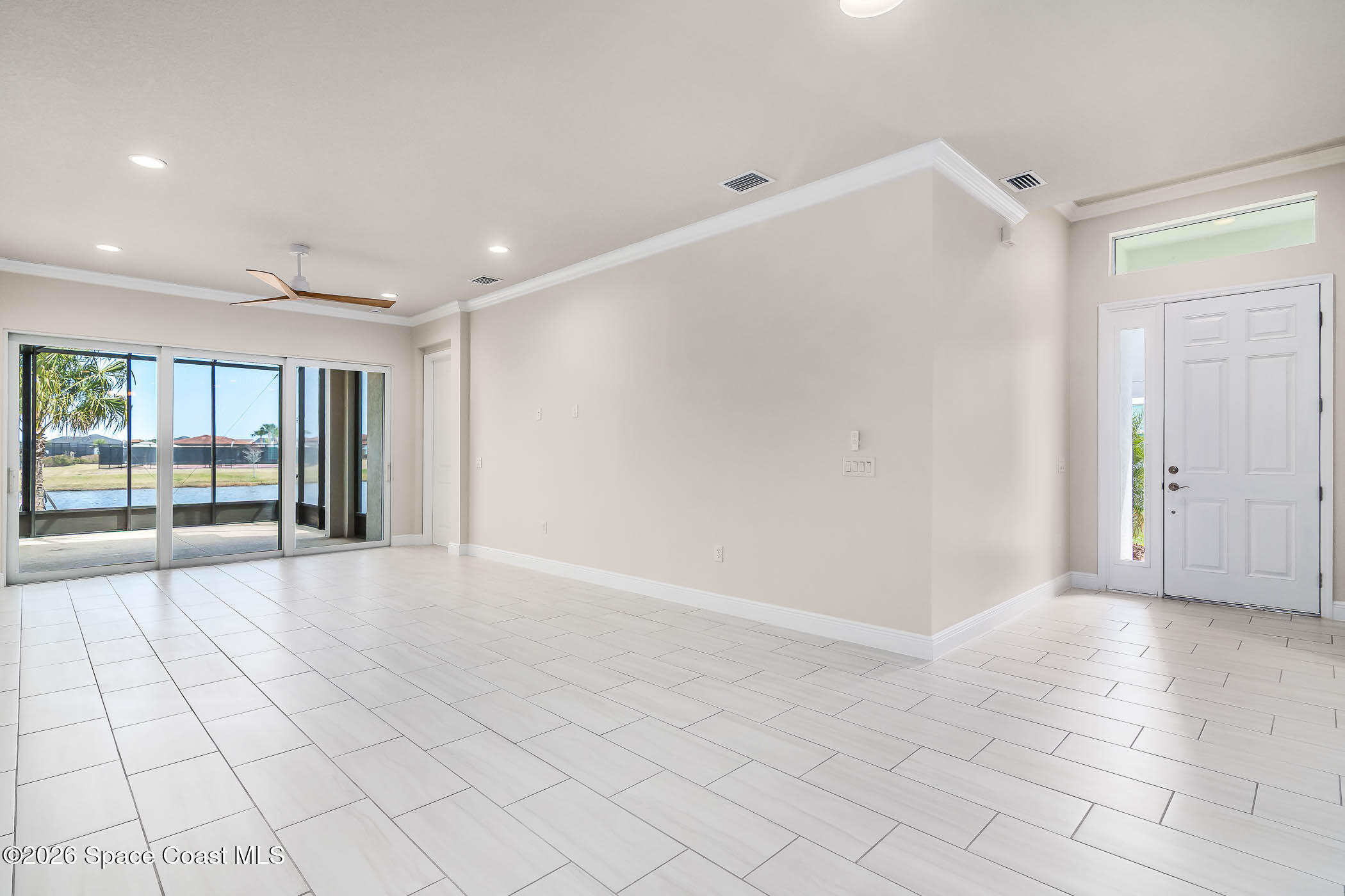 7929 Cache Crk Lane Melbourne, FL 32940 - Photo 11 of 45 a view of an empty room and window