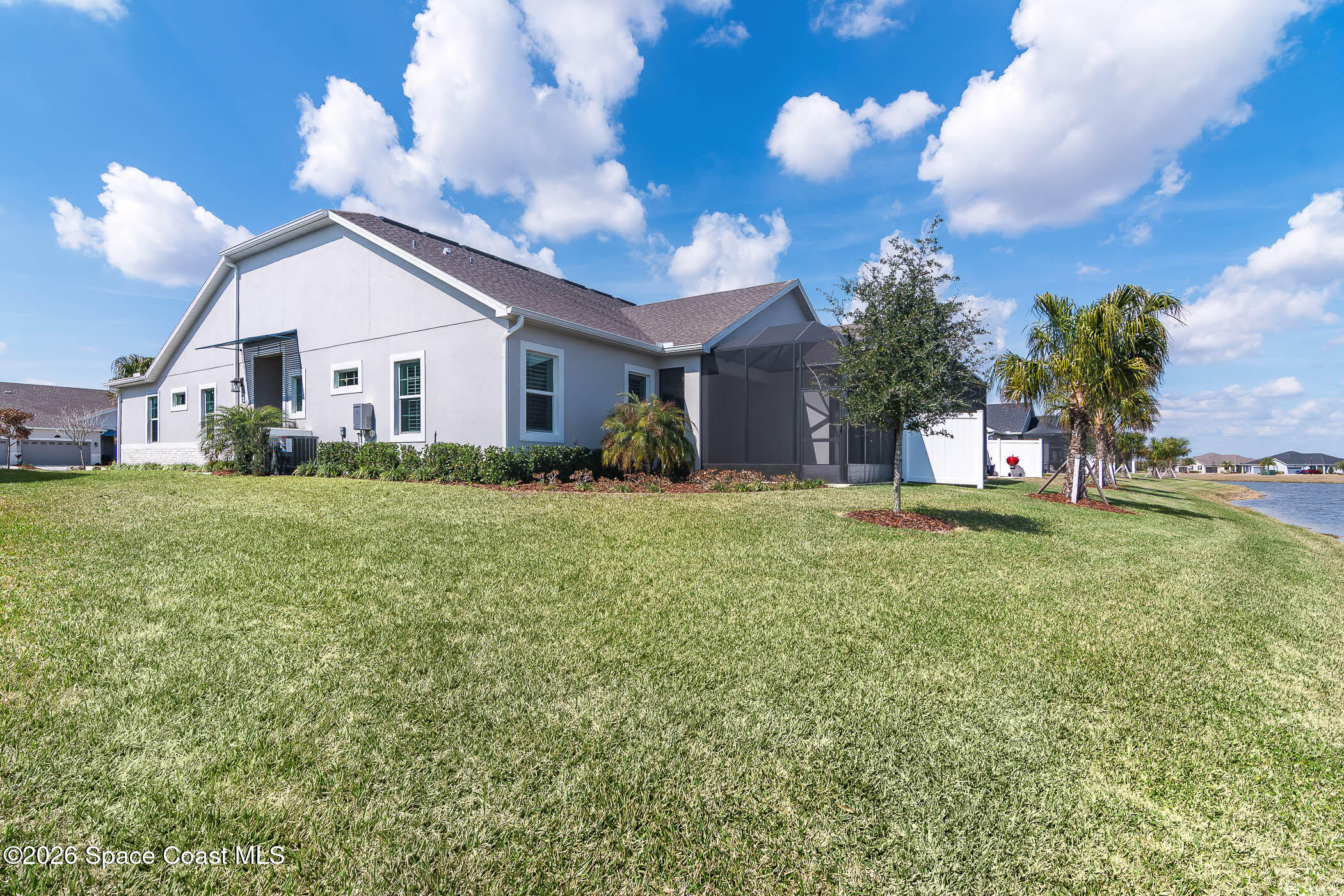 7929 Cache Crk Lane Melbourne, FL 32940 - Photo 25 of 45 a view of a house with a yard