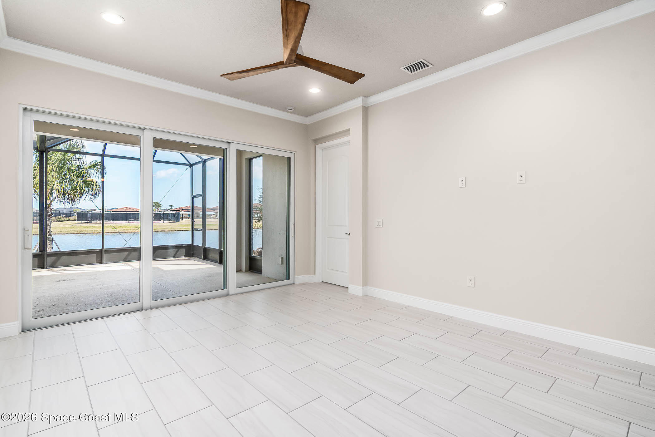 7929 Cache Crk Lane Melbourne, FL 32940 - Photo 43 of 45 a view of an empty room with a window