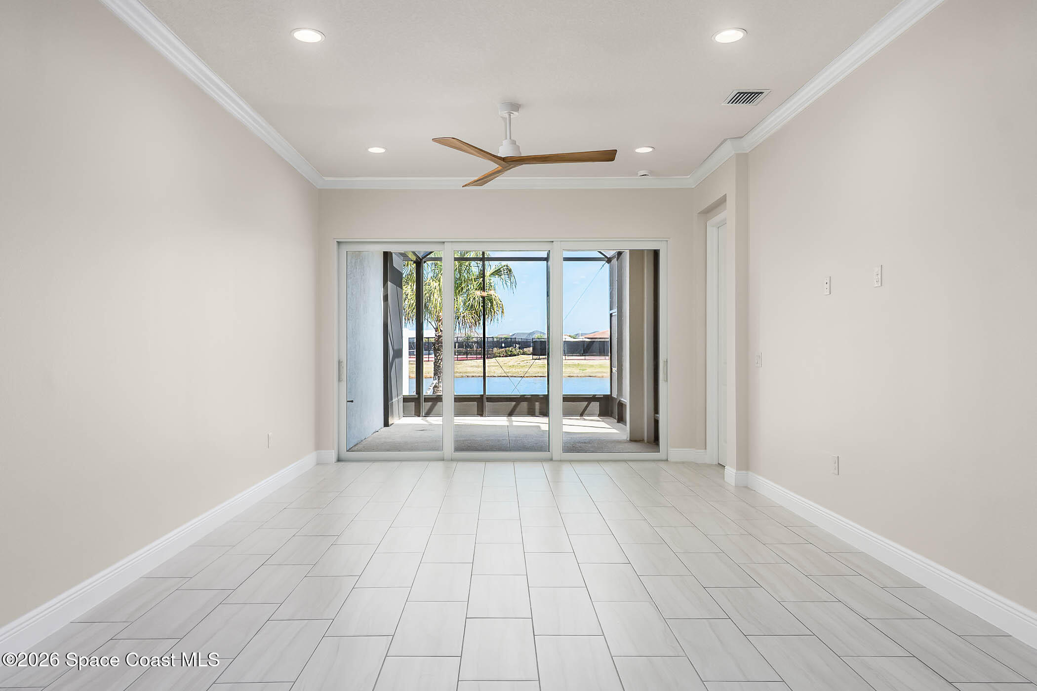 7929 Cache Crk Lane Melbourne, FL 32940 - Photo 44 of 45 a view of an empty room with a window