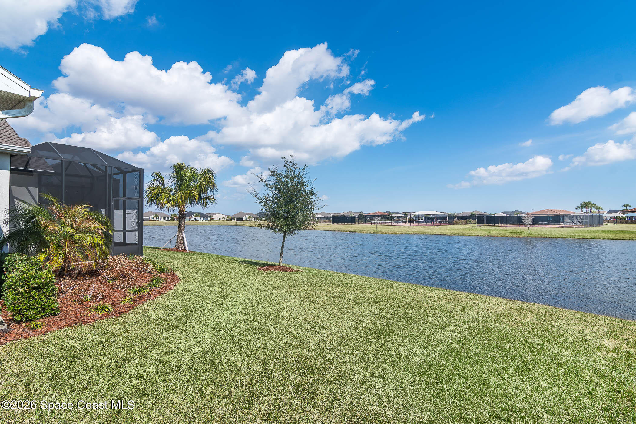 7929 Cache Crk Lane Melbourne, FL 32940 - Photo 8 of 45 a view of a lake