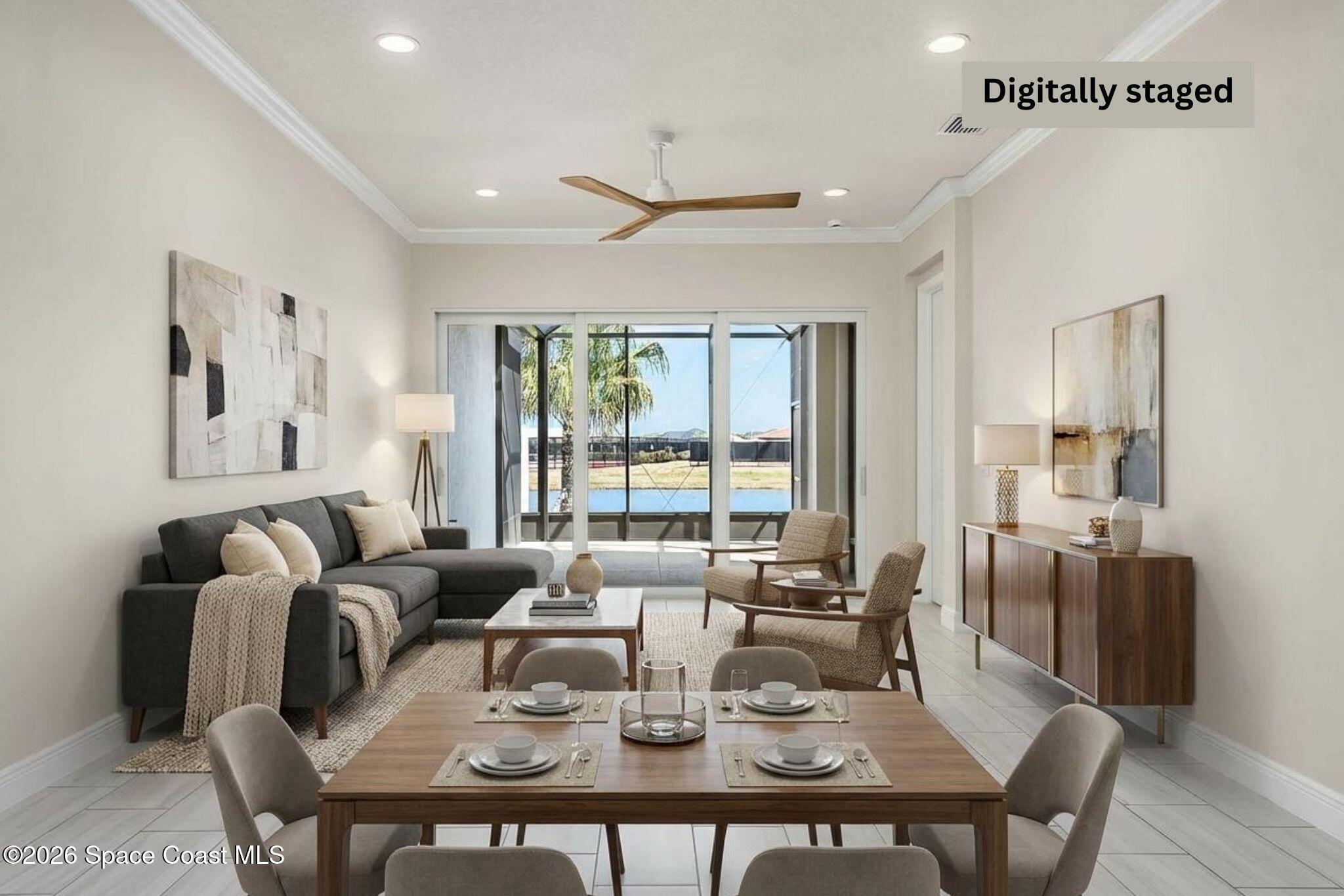 7929 Cache Crk Lane Melbourne, FL 32940 - Photo 9 of 45 a dining room with furniture a large window and a chandelier