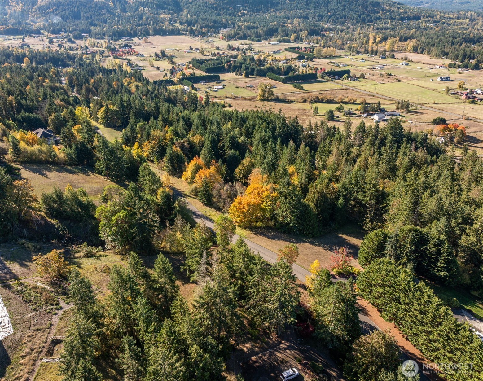 1051 Fox Hollow Road Sequim, WA 98382 - Photo 13 of 40 a view of a lake with a city