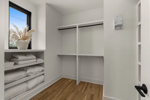 a view of an empty walk in closet