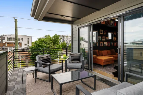 a building outdoor space with patio furniture