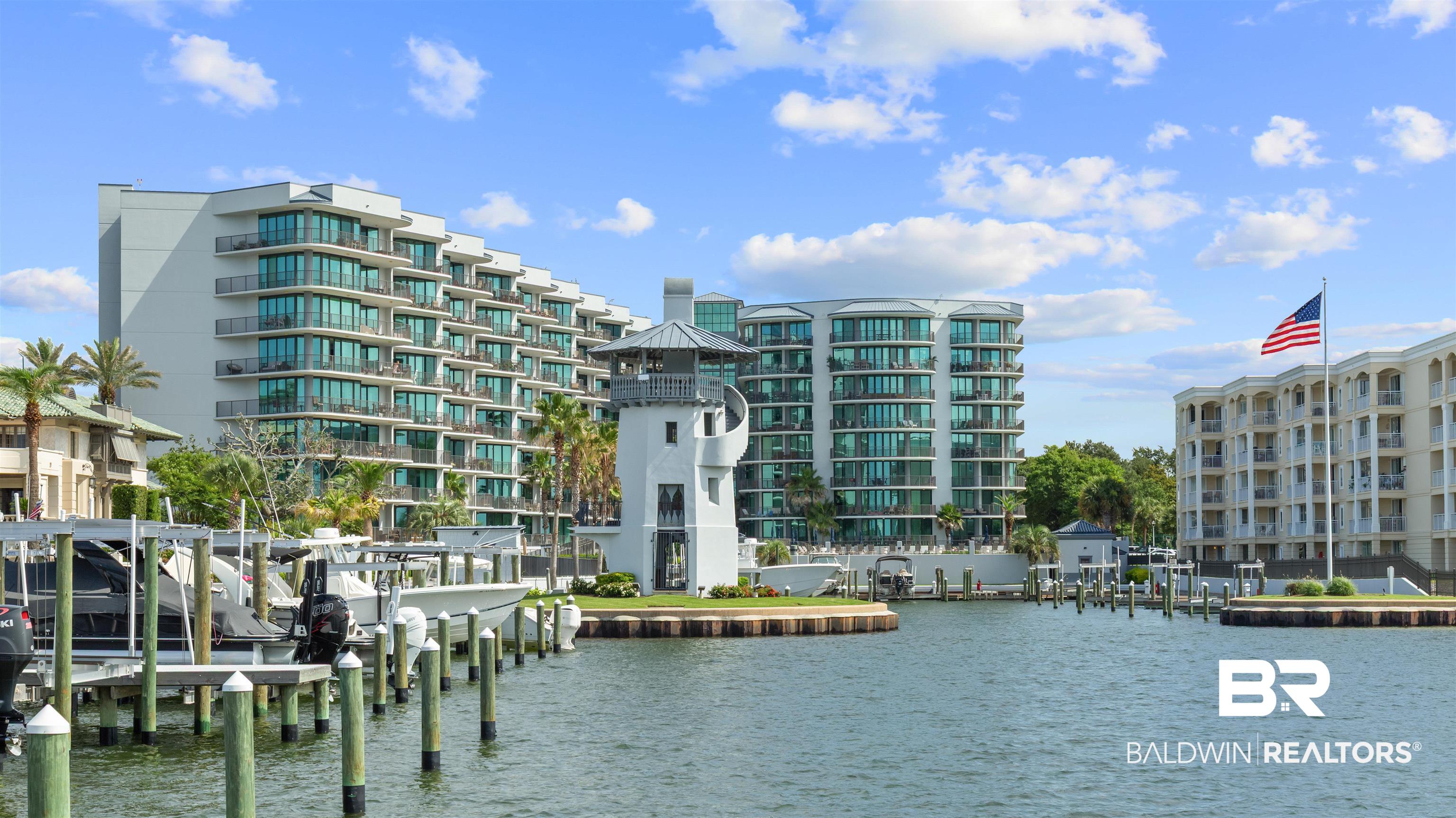 27582 Canal Road, Unit 2207 Orange Beach, AL 36561 - Photo 23 of 25 Water view with a dock