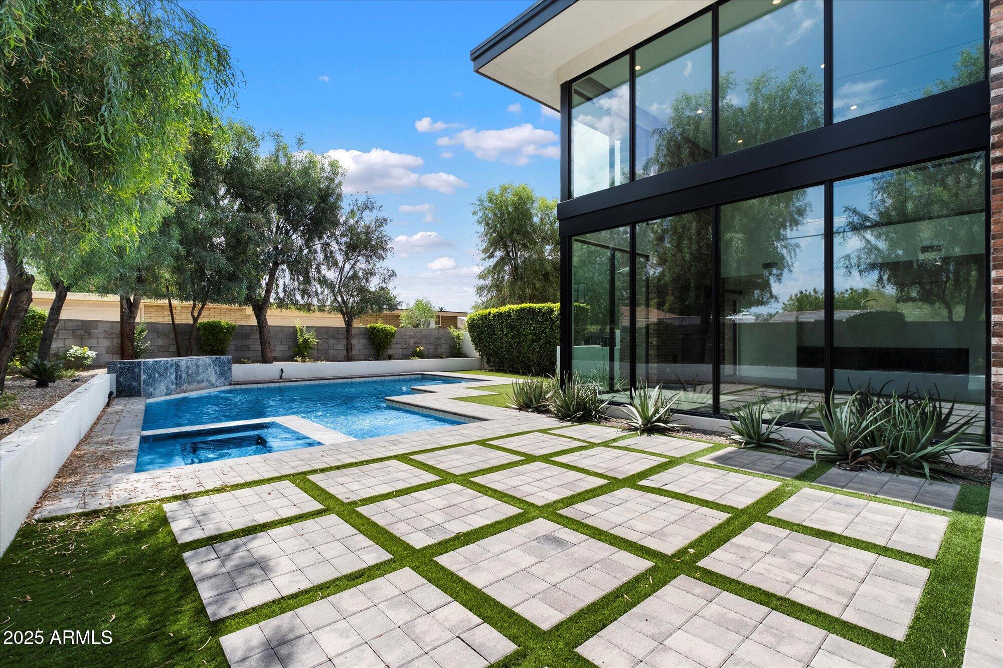 4525 North 36th Way Phoenix, AZ 85018 - Photo 39 of 40 a view of a backyard with sitting area