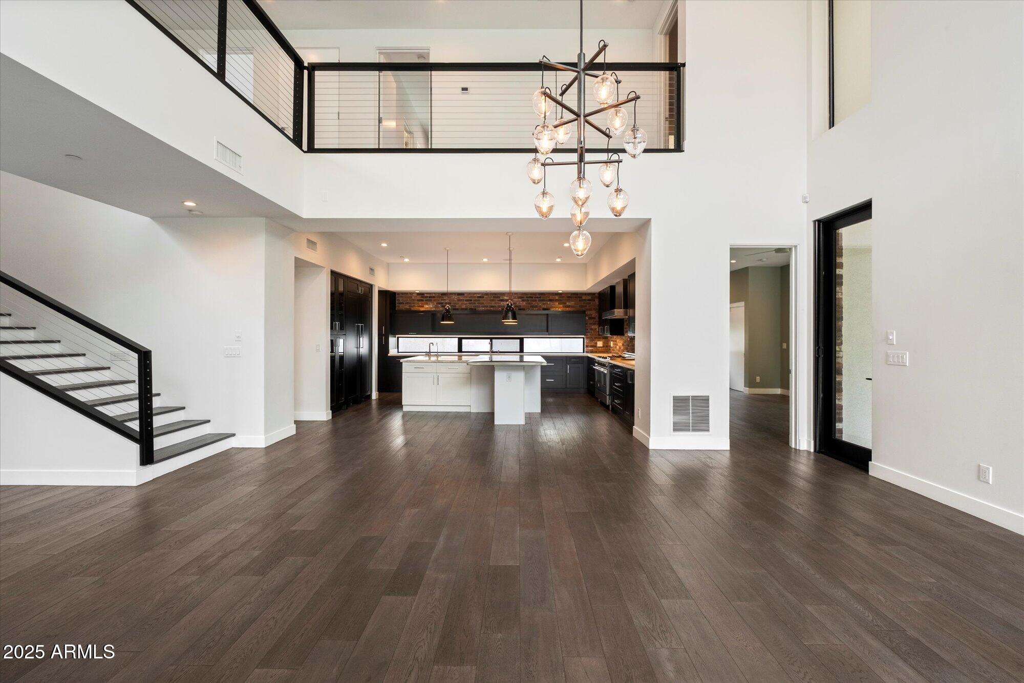 4525 North 36th Way Phoenix, AZ 85018 - Photo 6 of 40 a view interior of a house wooden floor and an entryway